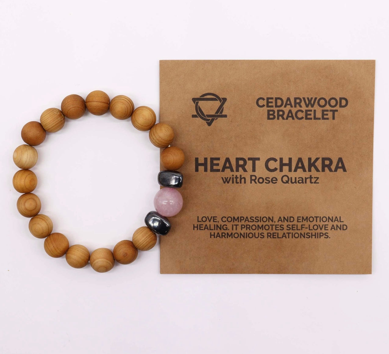 Pulsera de cedro con cuarzo rosa. Chakra corazón.