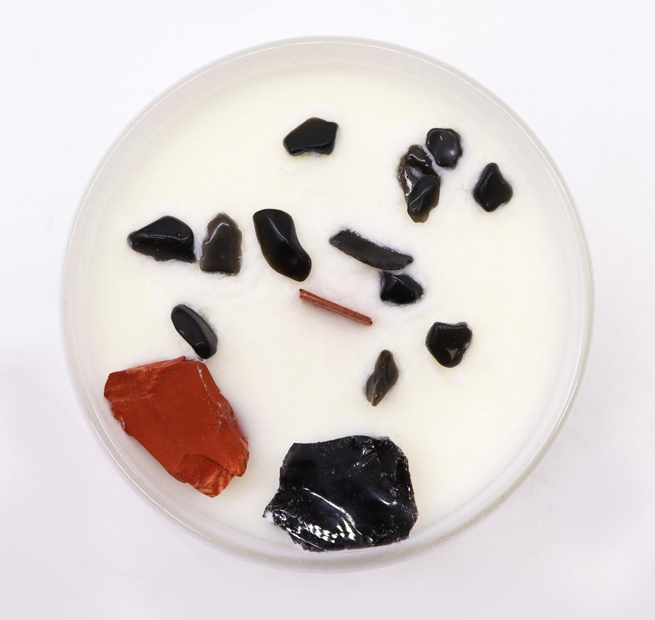 Vela con Jaspe rojo y Ágata Negra. Chakra Raiz